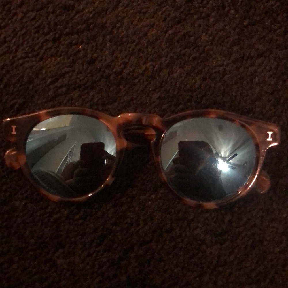 Illesteva sunglasses with blue lenses